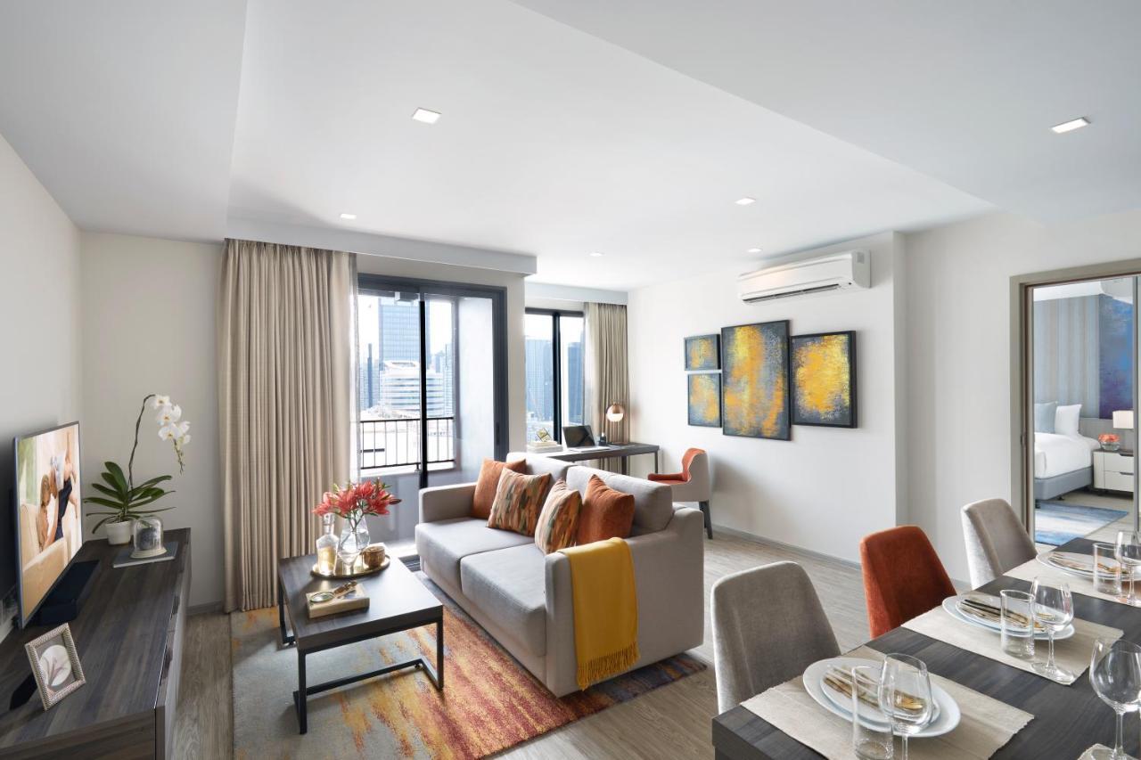 Somerset Rama 9 Banguecoque Exterior foto A living room